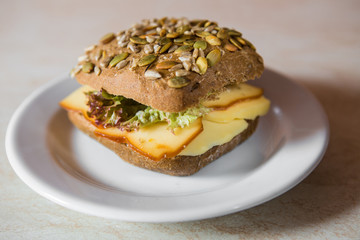 cheese pumpkin bun with fresh salad