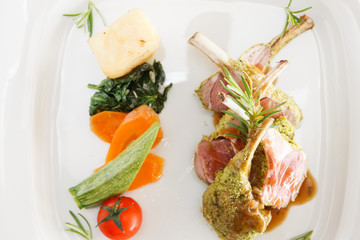 Lamb cutlets and vegetables
