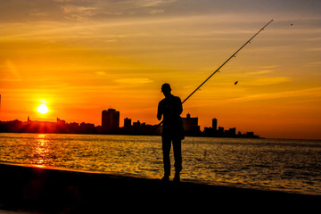 sunset with fisherman havana, cuba