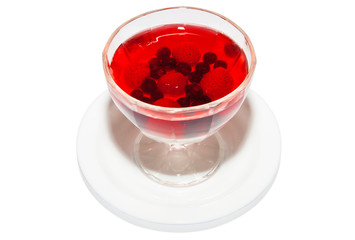 Dessert jelly with fruits and berries in glass. Isolated on