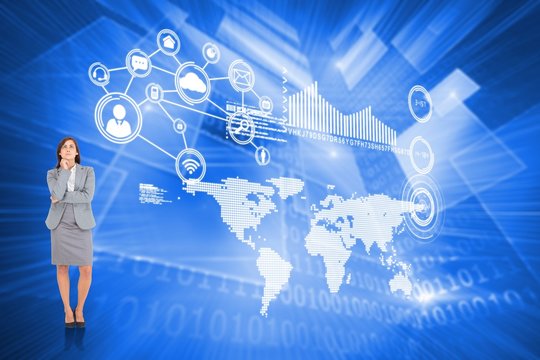 Composite image of focused businesswoman