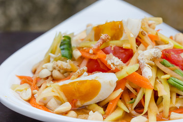 green papaya salad with salted egg