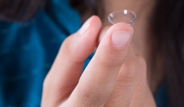 Young Asian Girl Wearing Contact Lens