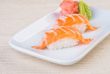 japanese cuisine. sushi salmon on the background