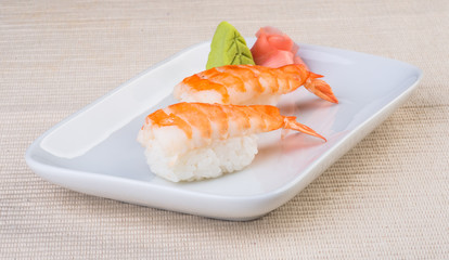 japanese cuisine. sushi shrimp on the background