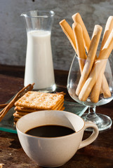 Breadsticks ,milk and Biscuits with black coffee in the morning.