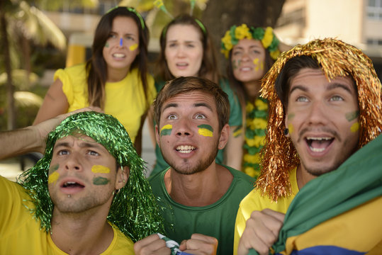 Astonished group of Brazilian sport soccer fans