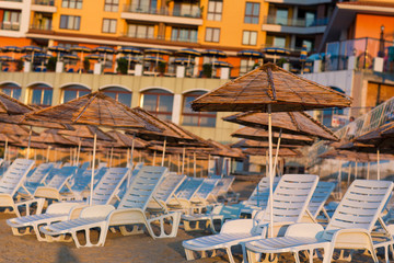 Fototapeta premium Beautiful view of a resort beach with sunshades