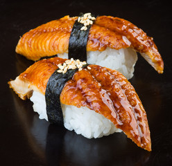 japanese cuisine. sushi unagi on the background