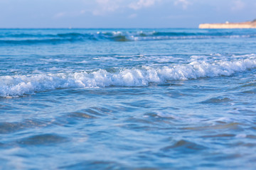Soft wave of the sea on a sandy beach