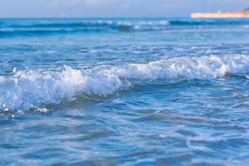 Soft wave of the sea on a sandy beach