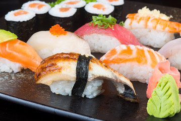 japanese cuisine. sushi set on the background