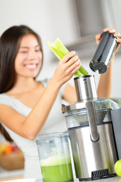 Vegetable Juice - Woman Juicing Green Vegetables