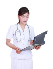 nurse reading medical report