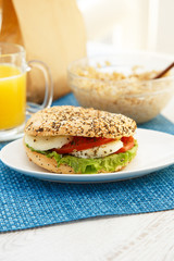 Mozarella sandwich on a blue tablecloth