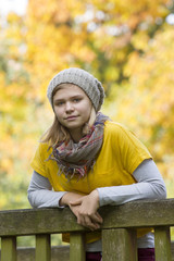 young girl in the autumn park