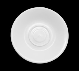 saucer on a black background