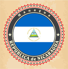 Vintage label cards of Nicaragua flag. Vector