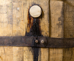 Macro shot of bung in wooden bourbon barrel