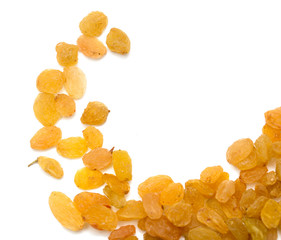 yellow raisins on a white background. macro