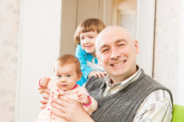 father and two young daughters