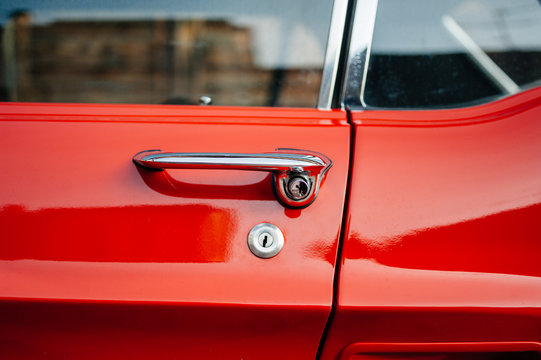 Detail Of A Vintage Red Car Handle Extreme Close-up