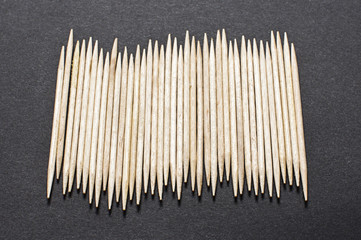 Toothpicks on the dark background