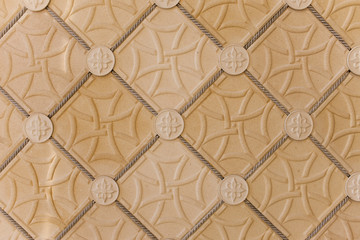 Close up texture of ornament with tiles and rope