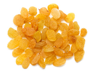 yellow raisins on a white background. macro