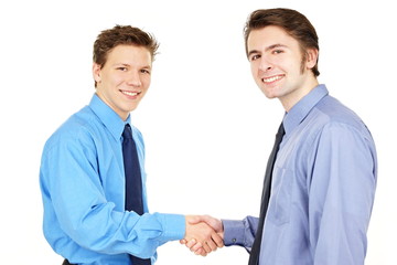 Young business people shaking hands