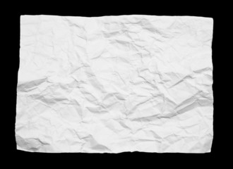 crumpled white paper on black background