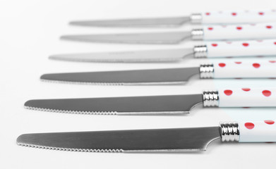 Silver knives isolated on white