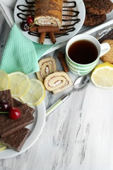 Cup of tea and sweets close up