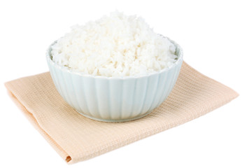 Cooked rice in bowl isolated on white