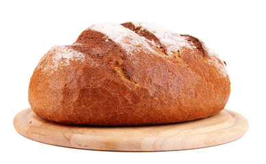 Rye bread on wooden stand isolated on white