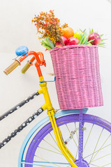 Bicycle with basket fruit and flower