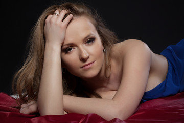 Obraz premium Portrait of sensual relaxed girl looking at camera