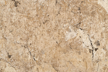 abstract background of cracked clay wall