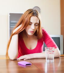 sadness  woman with mobile phone