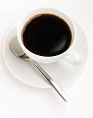 coffee cup and spoon on white background