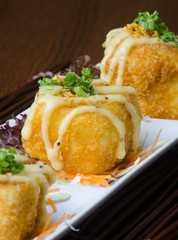 japanese cuisine. fried tofu on the background