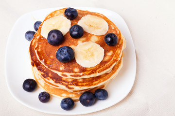 Pancakes with blueberry and bananas