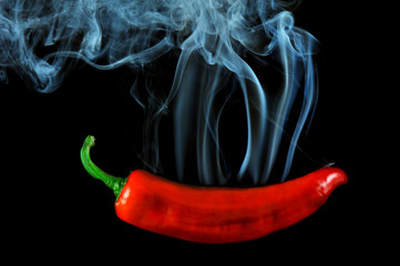 Red Pepper with smoke isolated black backgraund