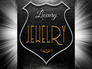 Luxury jewelery sign on black leather