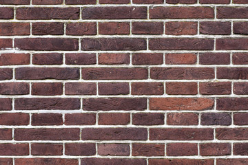 Dark brown pattern brick wall image.