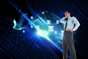 Composite image of thinking businessman with hand on head