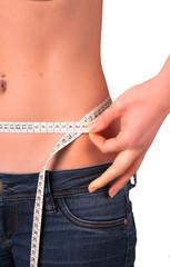 Diet concept. Woman measuring her waist, isolated 
