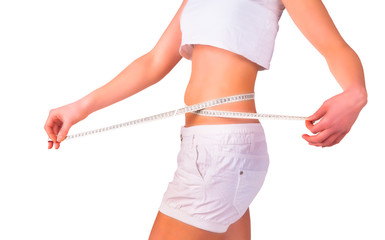 Diet concept. Woman measuring her waist, isolated 