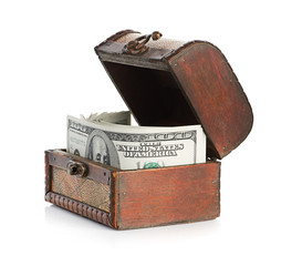 Dollar-bills in the old wooden treasure chest