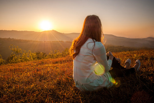 Fototapeta Woman and sunsets